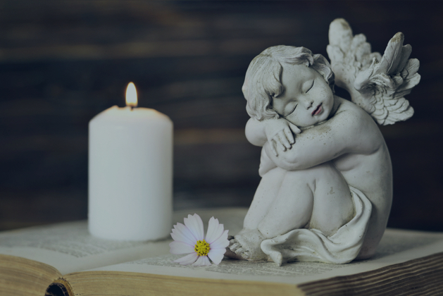 Sitting Angel Statue — Funeral Service in Taree, NSW